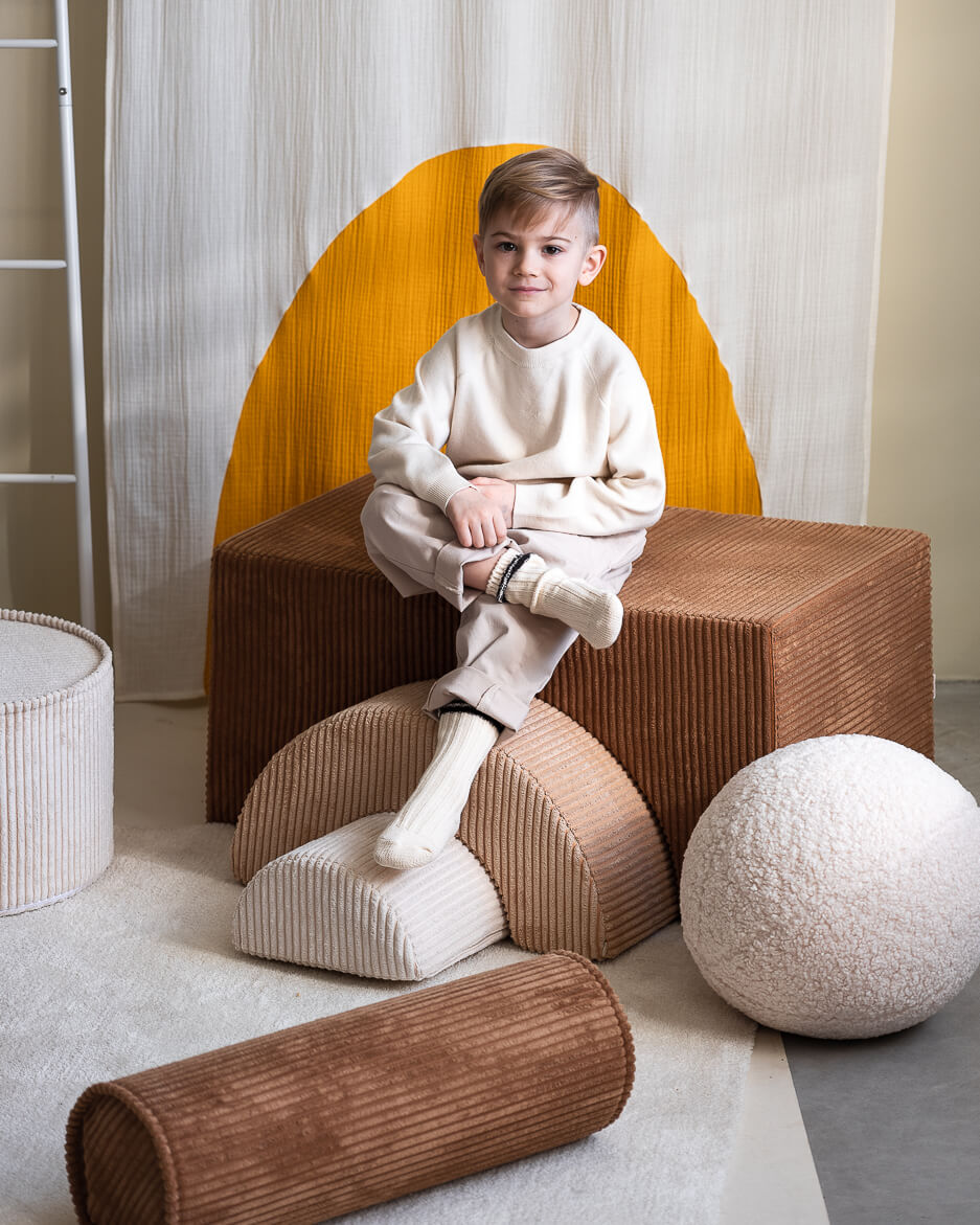 Wigiwama Toffee Roll Cushion